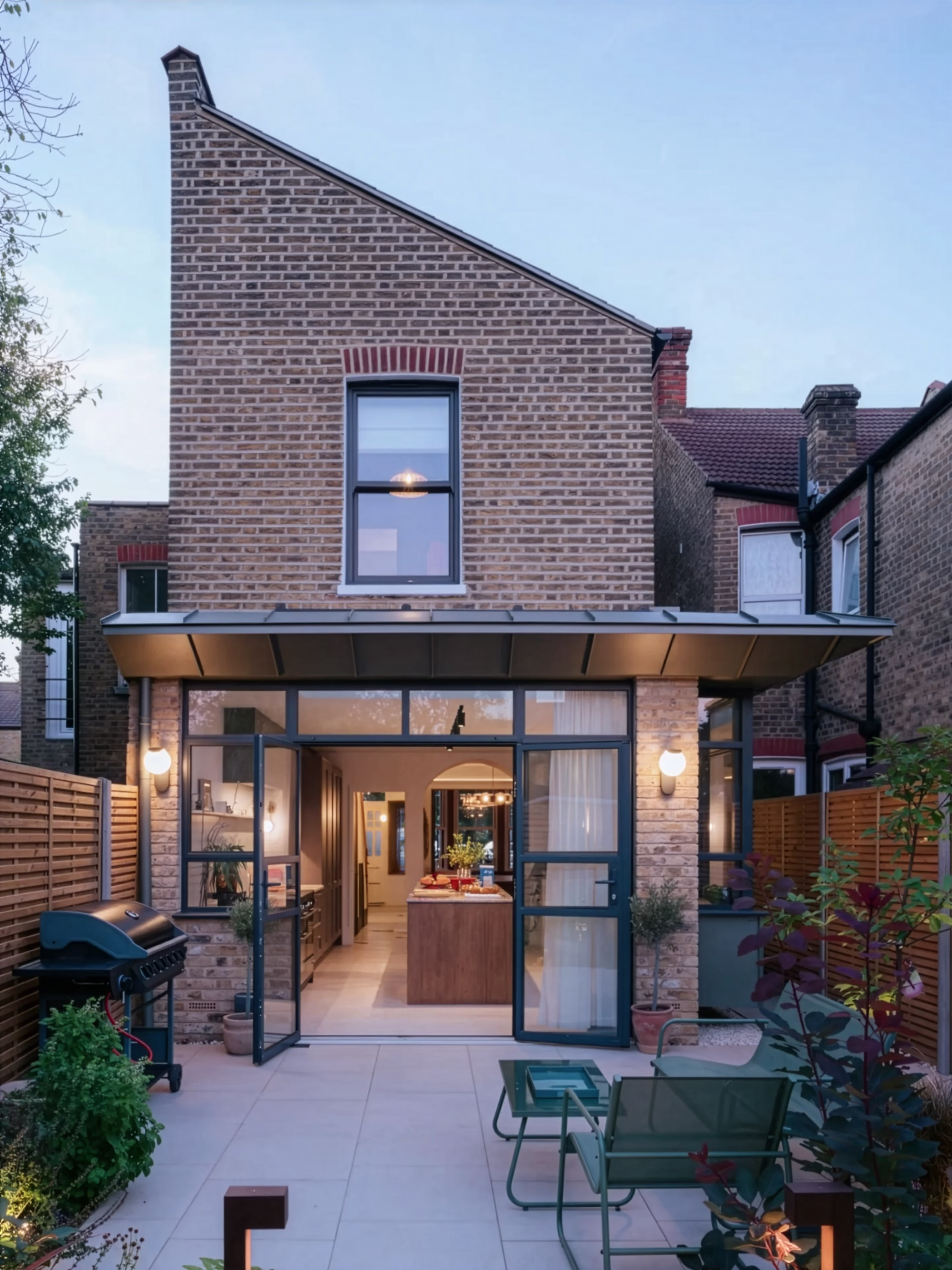 tooting-house-studio-colab-green-zinc-extension-oriel-window-london-brick-extension-Firefly-Upscaler-2x-scale-scaled.avif
